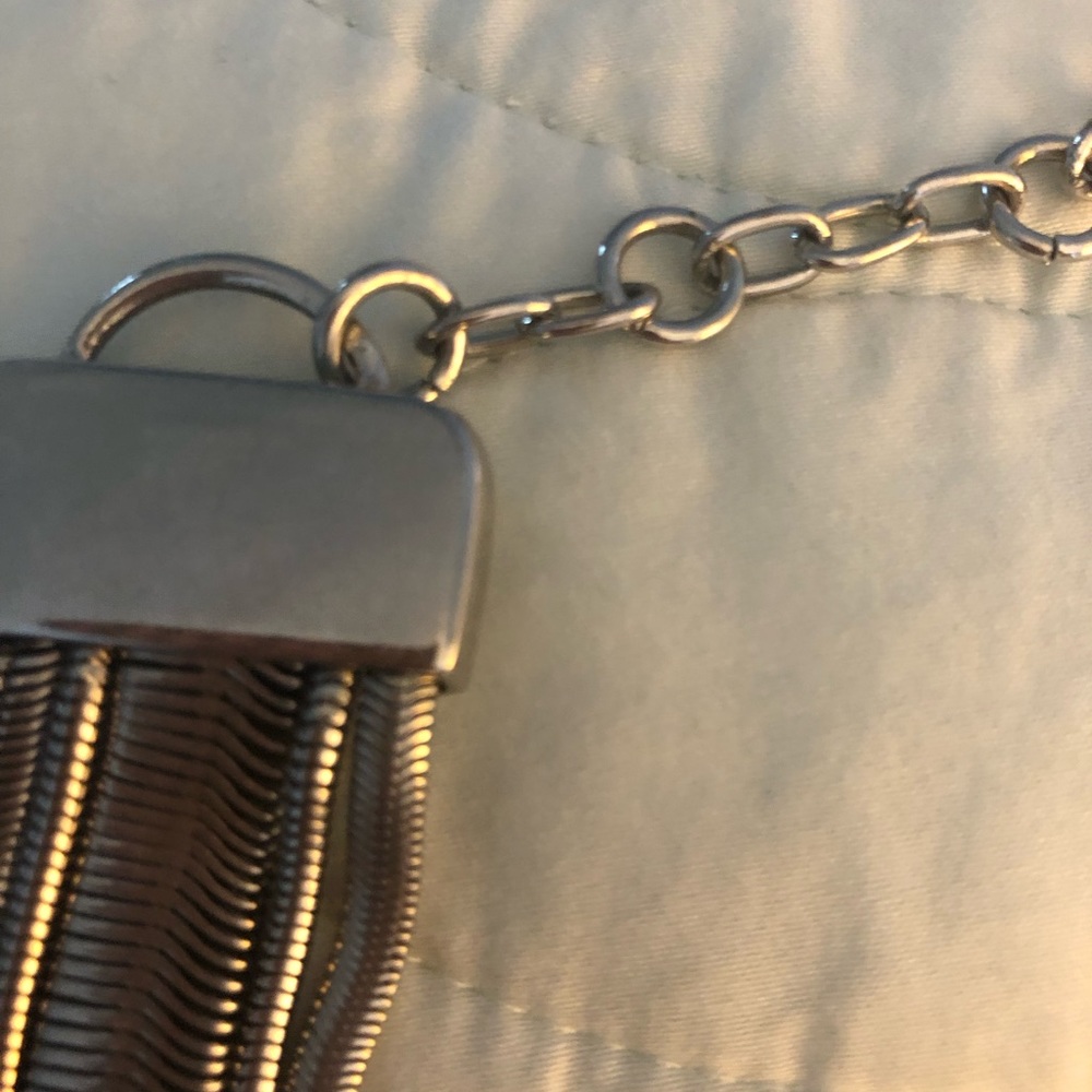 Flattering Silver layered neck piece elegant or casual accessory